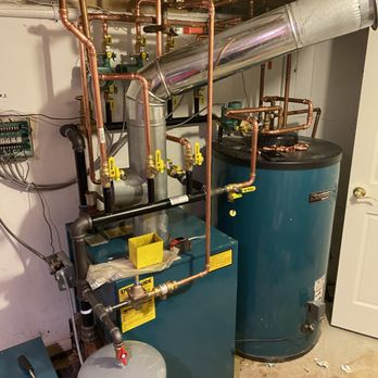 Oil-fired boiler with hot water tank